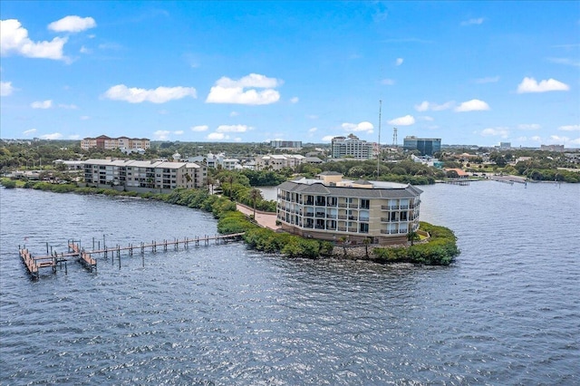 birds eye view of property with a water view