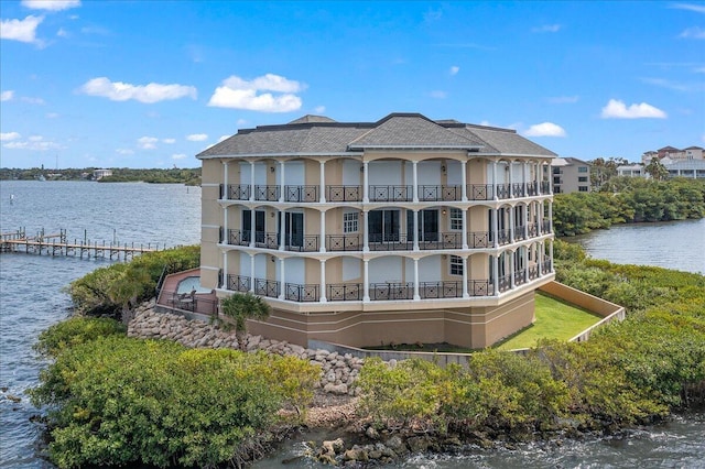 view of building exterior featuring a water view