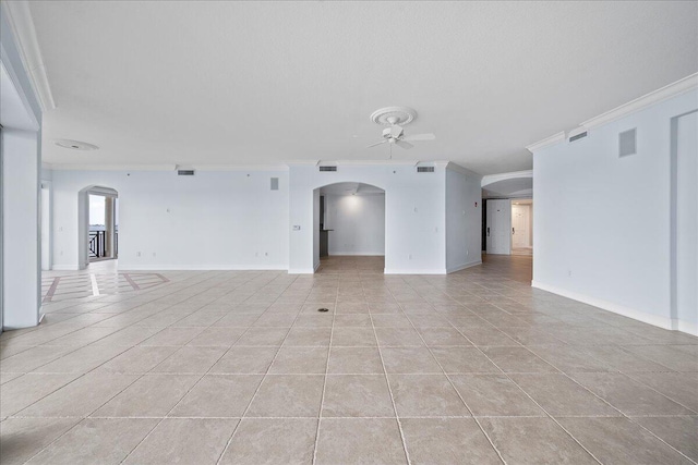 unfurnished living room featuring crown molding, ceiling fan, and light tile patterned floors