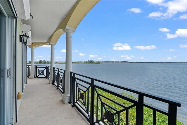 balcony featuring a water view