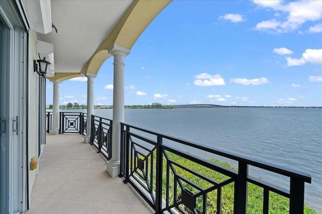 balcony featuring a water view