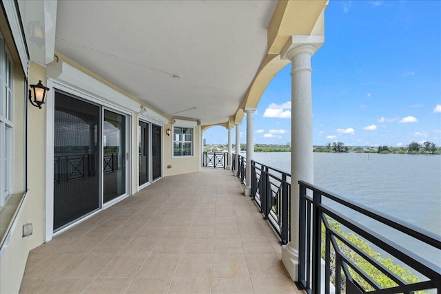 balcony featuring a water view