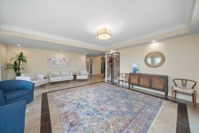 living room featuring ornamental molding, a tray ceiling, baseboards, and recessed lighting