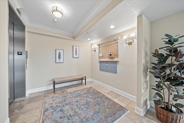 corridor with a textured ceiling, ornamental molding, baseboards, and elevator