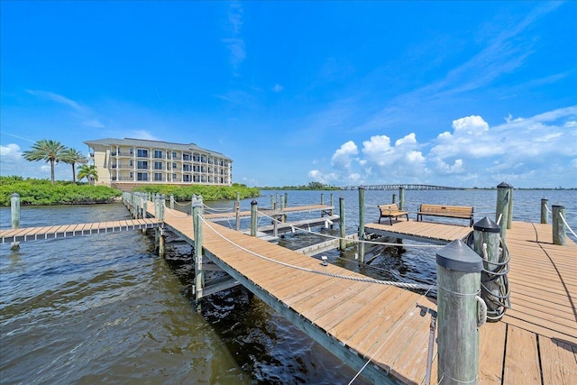 view of dock with a water view