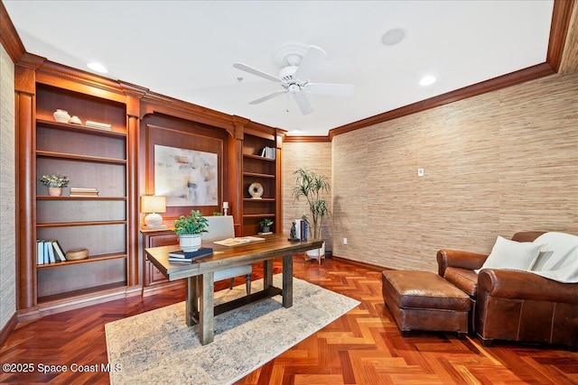 office space featuring ceiling fan and ornamental molding