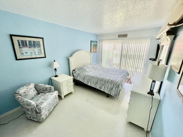 bedroom with a textured ceiling