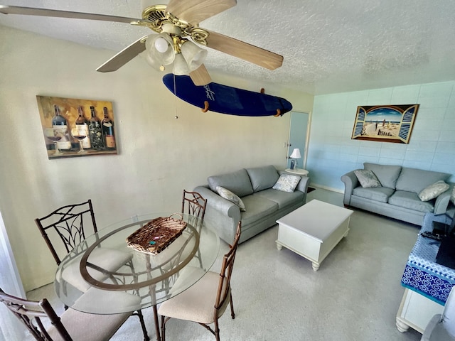 living room with a textured ceiling