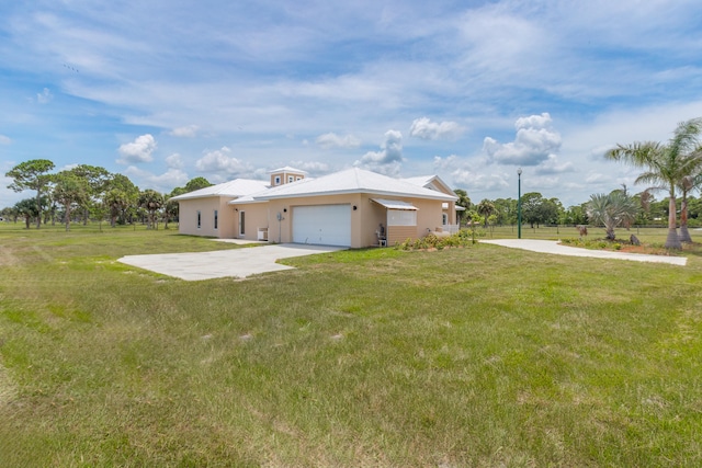 view of property exterior featuring a garage and a yard