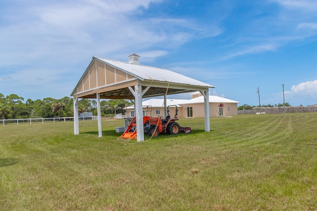 view of property's community featuring a yard and a gazebo