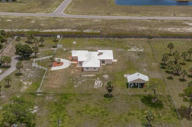 birds eye view of property featuring a rural view