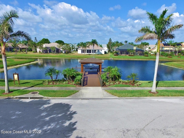 property view of water with a gazebo