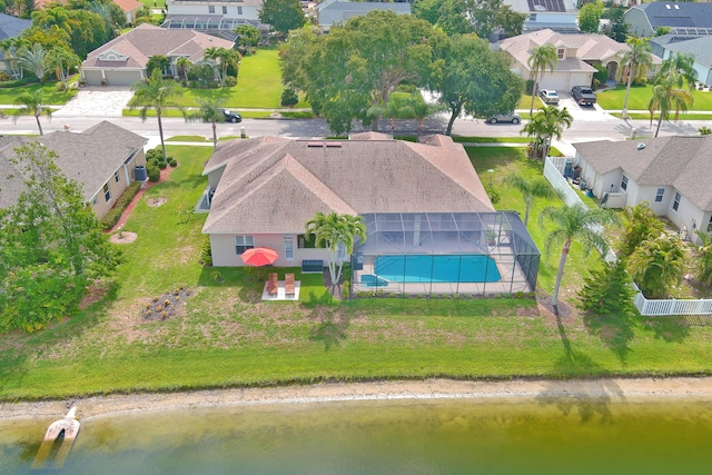 birds eye view of property featuring a water view