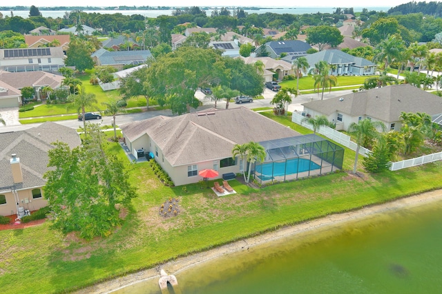 birds eye view of property featuring a water view