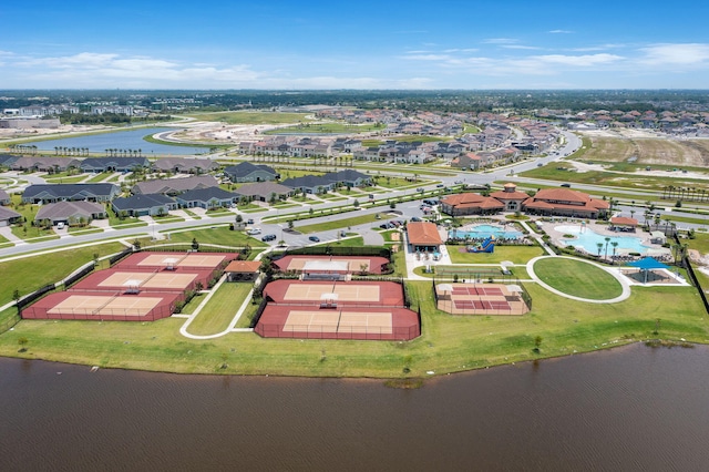 drone / aerial view with a water view