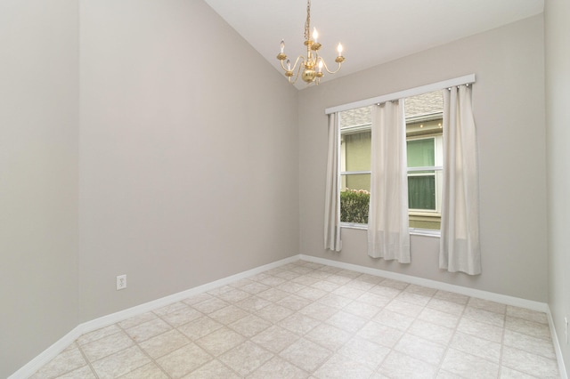 tiled spare room featuring an inviting chandelier and lofted ceiling