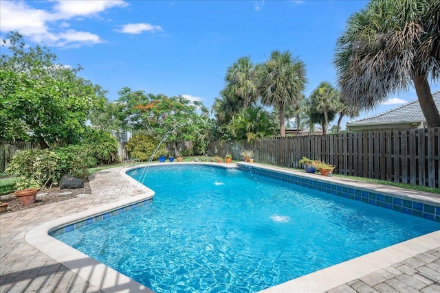 view of pool with pool water feature