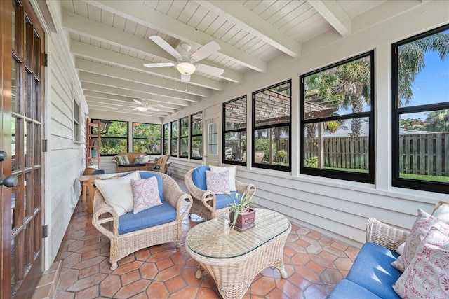 sunroom with beam ceiling