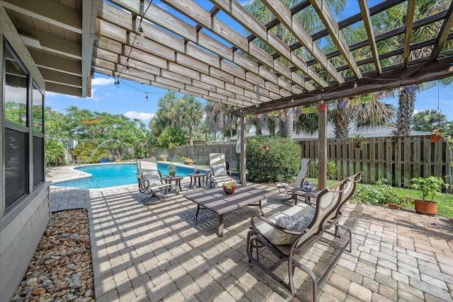 view of patio with a pergola, a fenced in pool, and pool water feature