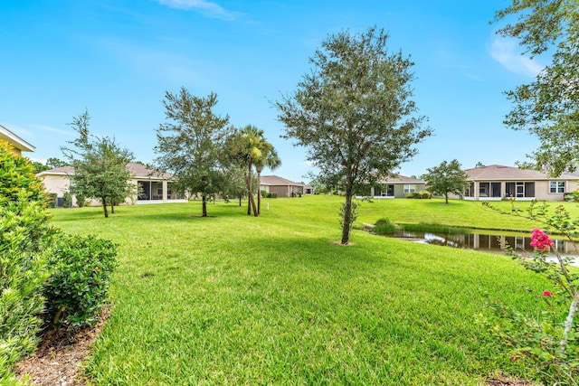 view of yard with a water view