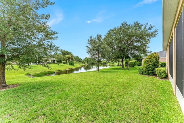 view of yard with a water view