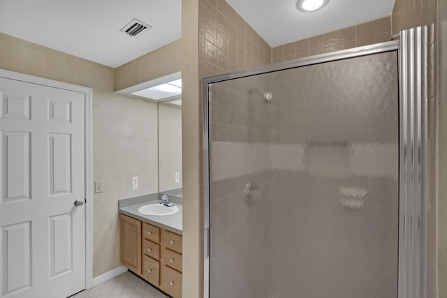 bathroom featuring vanity and walk in shower