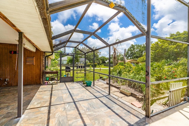 view of patio / terrace with glass enclosure