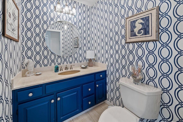 bathroom with vanity and toilet