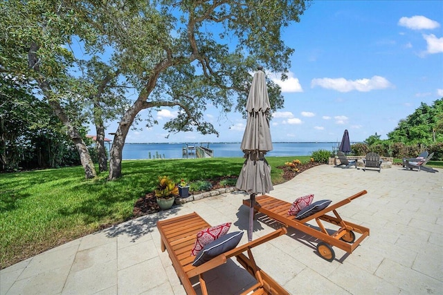 view of patio / terrace with a water view