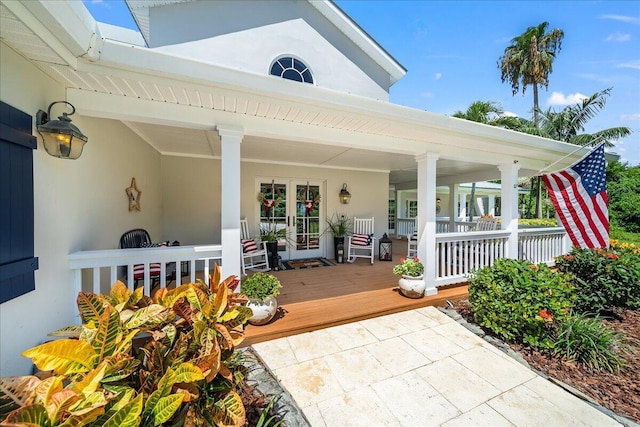 property entrance with covered porch