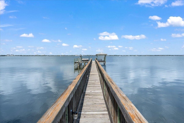 view of dock with a water view