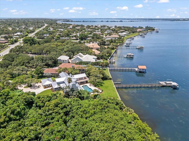 drone / aerial view with a water view