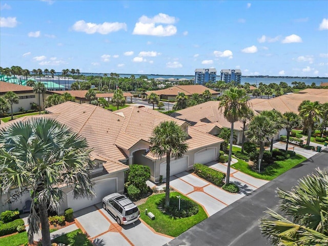 bird's eye view with a water view