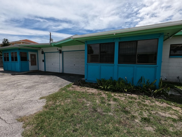 view of home's exterior featuring a garage