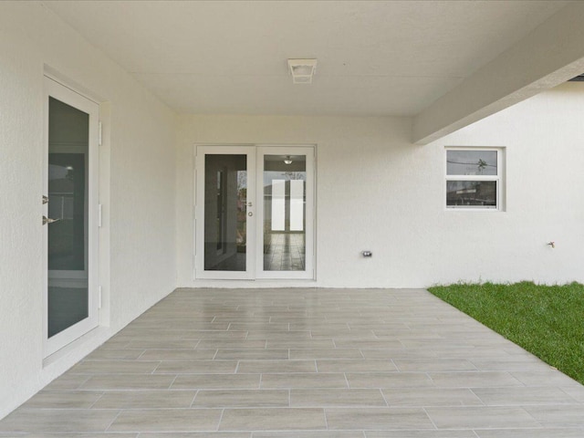 view of patio featuring french doors