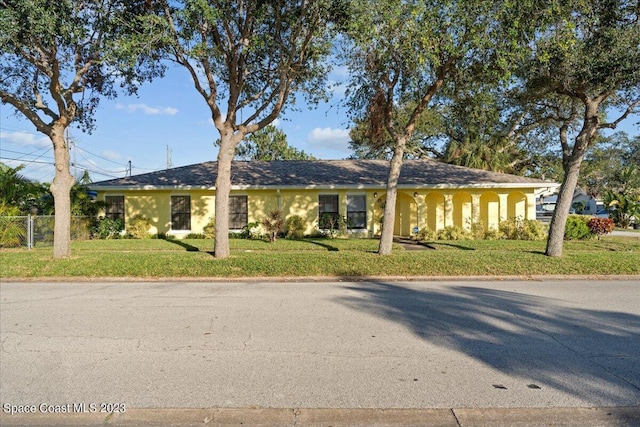 202 Monroe Ave, Cape Canaveral, FL 32920 - single story home featuring a front yard