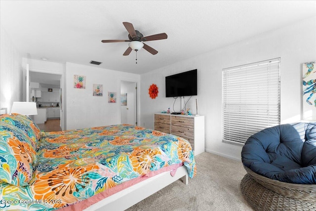 202 Monroe Ave, Cape Canaveral, FL 32920 - carpeted bedroom featuring ceiling fan