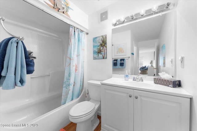 202 Monroe Ave, Cape Canaveral, FL 32920 - full bathroom featuring shower / tub combo, vanity, and toilet