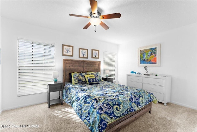 202 Monroe Ave, Cape Canaveral, FL 32920 - carpeted bedroom with ceiling fan