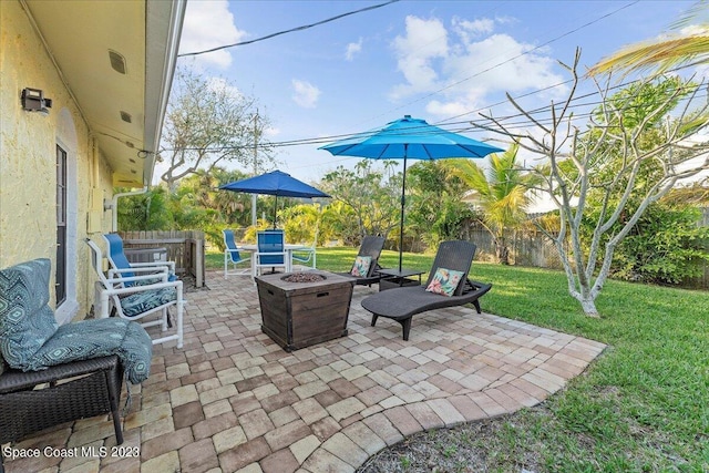 202 Monroe Ave, Cape Canaveral, FL 32920 - view of patio / terrace with a fire pit