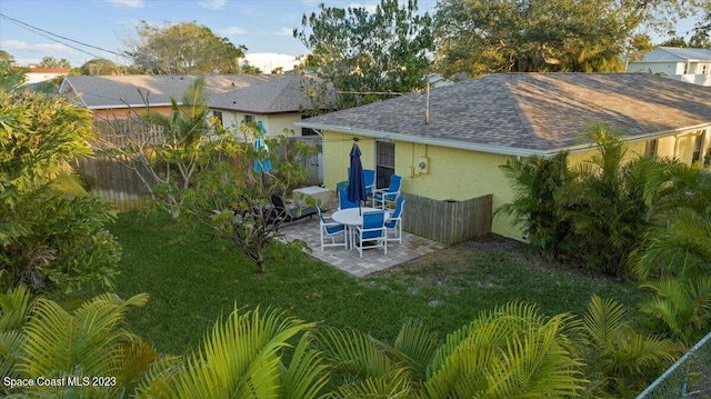 202 Monroe Ave, Cape Canaveral, FL 32920 - view of yard featuring a patio area