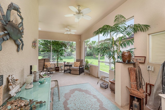 sunroom / solarium with ceiling fan