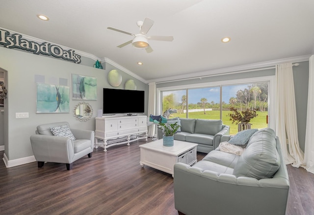 living room featuring dark hardwood / wood-style floors, ceiling fan, vaulted ceiling, and crown molding