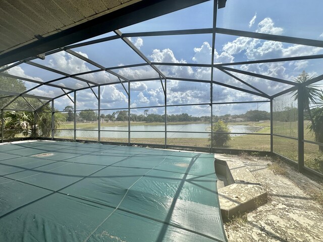 368 Fairgreen Pl, Casselberry, FL 32707 - view of swimming pool featuring a water view, glass enclosure, and a patio