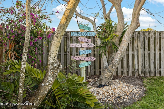 exterior details featuring fence