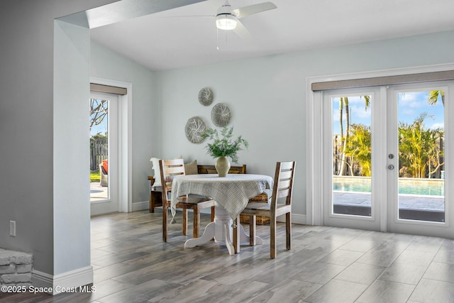 dining room with ceiling fan, french doors, wood finished floors, and a wealth of natural light