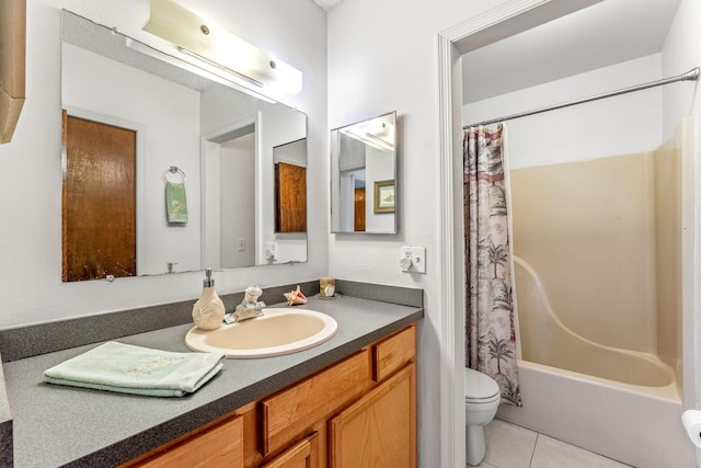 full bathroom featuring tile patterned floors, shower / bathtub combination with curtain, vanity, and toilet