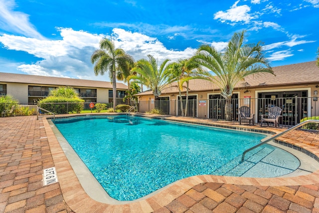 view of pool featuring a patio area