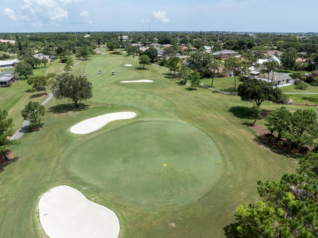 birds eye view of property featuring golf course view