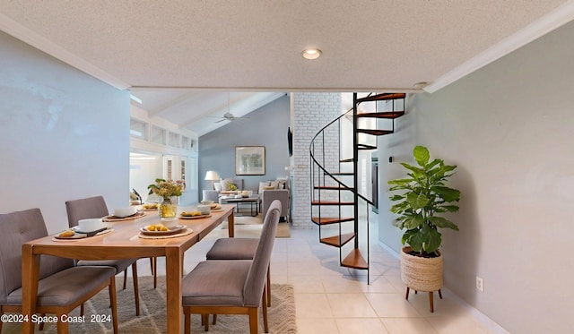 dining area featuring a ceiling fan, stairs, vaulted ceiling, a textured ceiling, and light tile patterned flooring